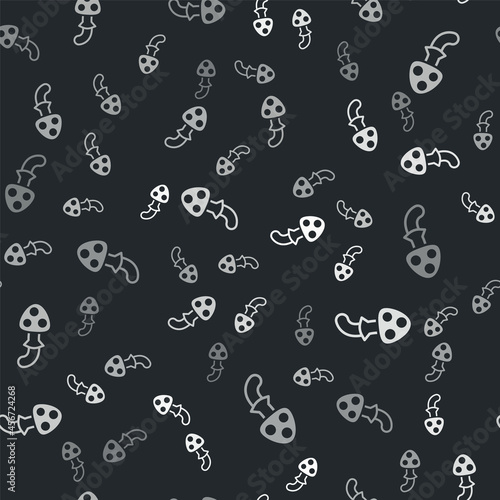 Grey Psilocybin mushroom icon isolated seamless pattern on black background. Psychedelic hallucination. Vector