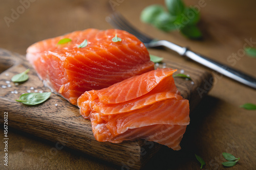 A piece of smoked salmon, cut into thin slices