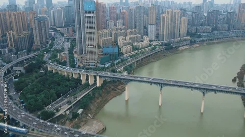 Monorail metro in Chongqing, China. Chongqing is a giant city in southwestern China, founded at the confluence of the Yangtze and Jialingjiang rivers. (aerial photography) photo