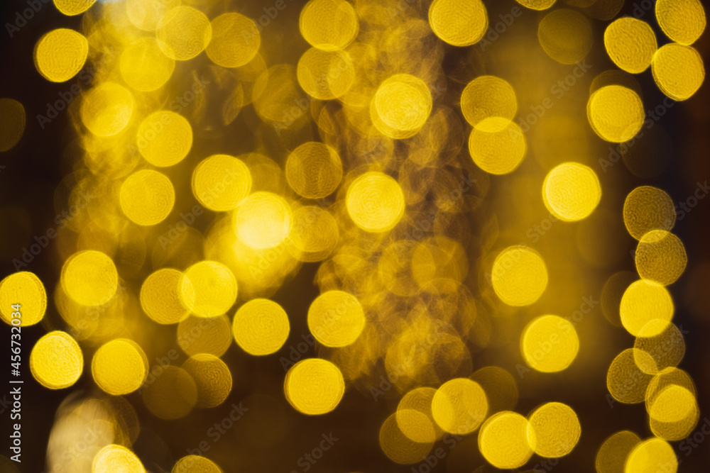 Obraz premium Golden glow bokeh light and shine with black background