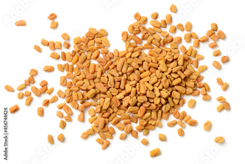 fenugreek seeds isolated on the white background, top view photo