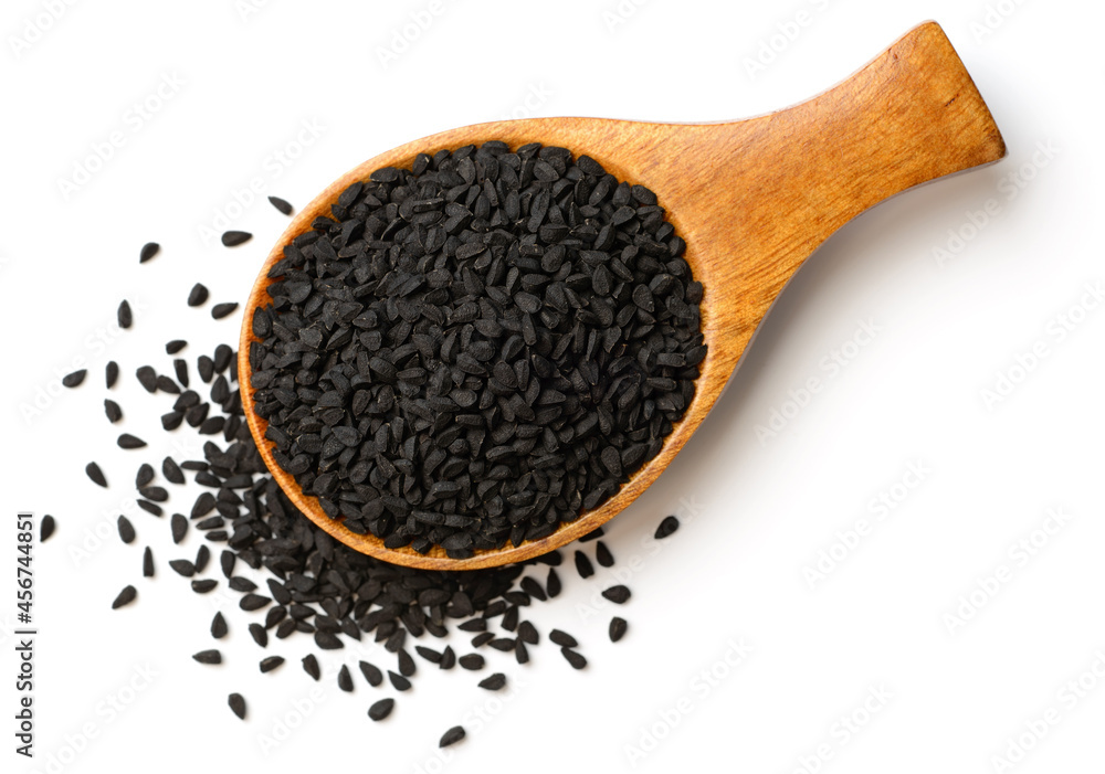 black cumin seeds isolated on the white background, top view black cumin seeds isolated on the white background, top view
