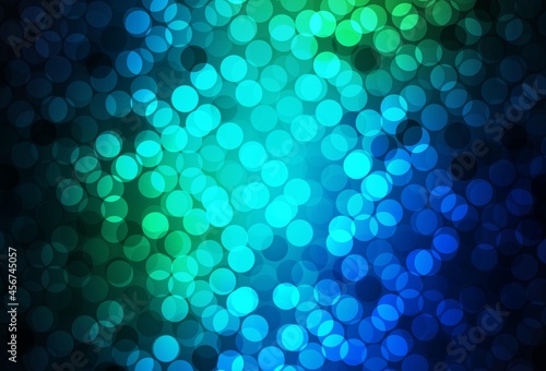 Dark Blue, Green vector background with spots.