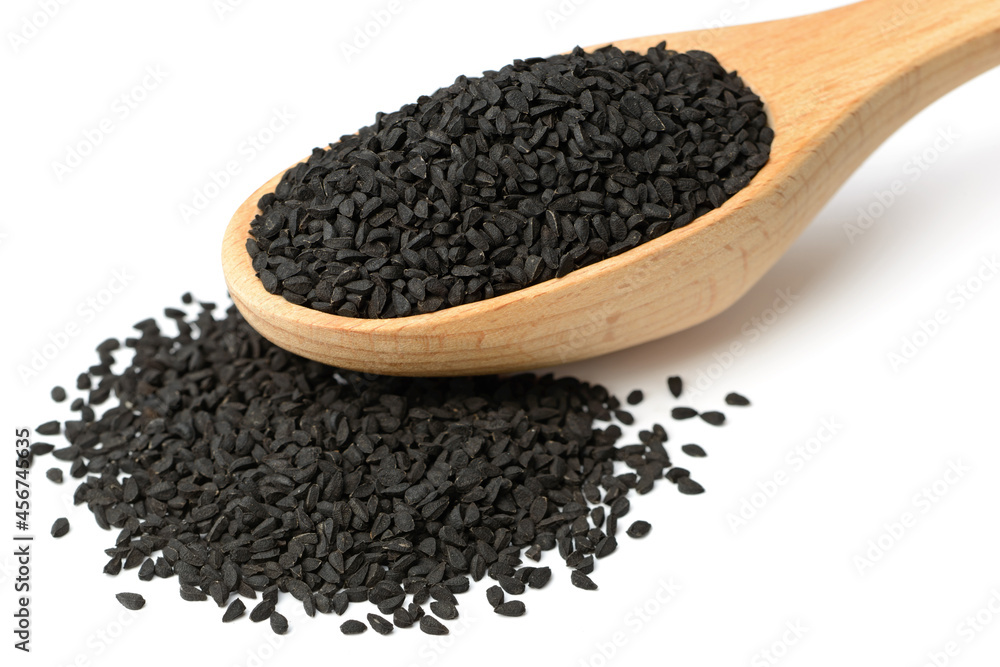 black cumin seeds isolated on the white background black cumin seeds isolated on the white background