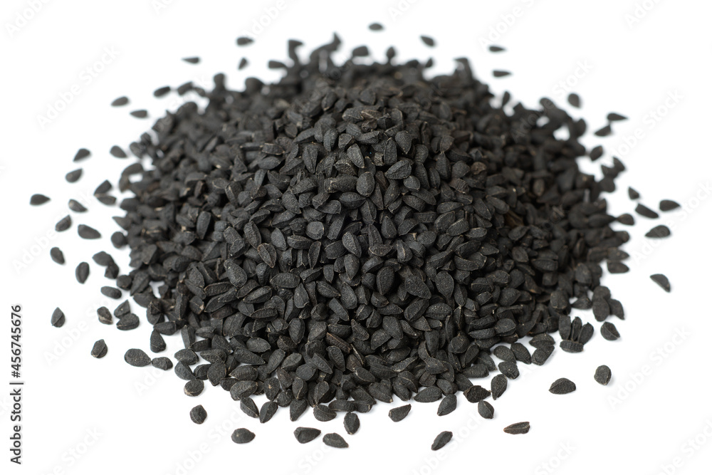 black cumin seeds isolated on the white background black cumin seeds isolated on the white background