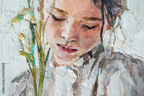 Fototapeta Naklejka Na Ścianę i Meble -  Girl with a flower in her hand on a white background. Oil painting on canvas.