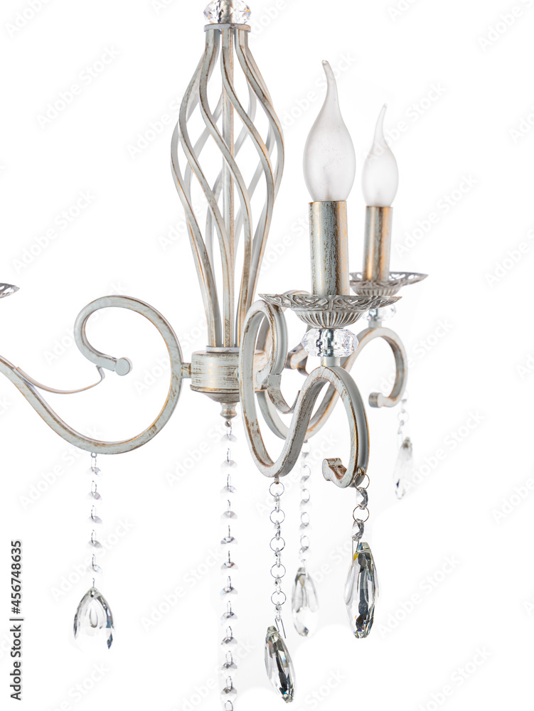 yellow gold chandelier with decorations hanging on a white background yellow gold chandelier with decorations hanging on a white background