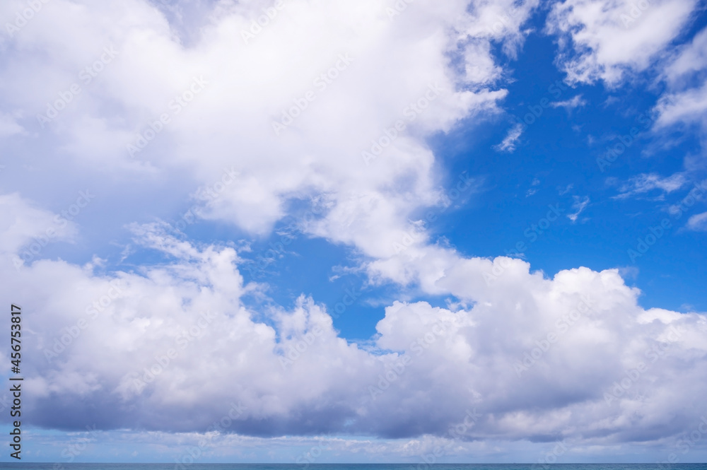 Blue sky with white clouds over tropical sea Nature composition beautiful clouds background