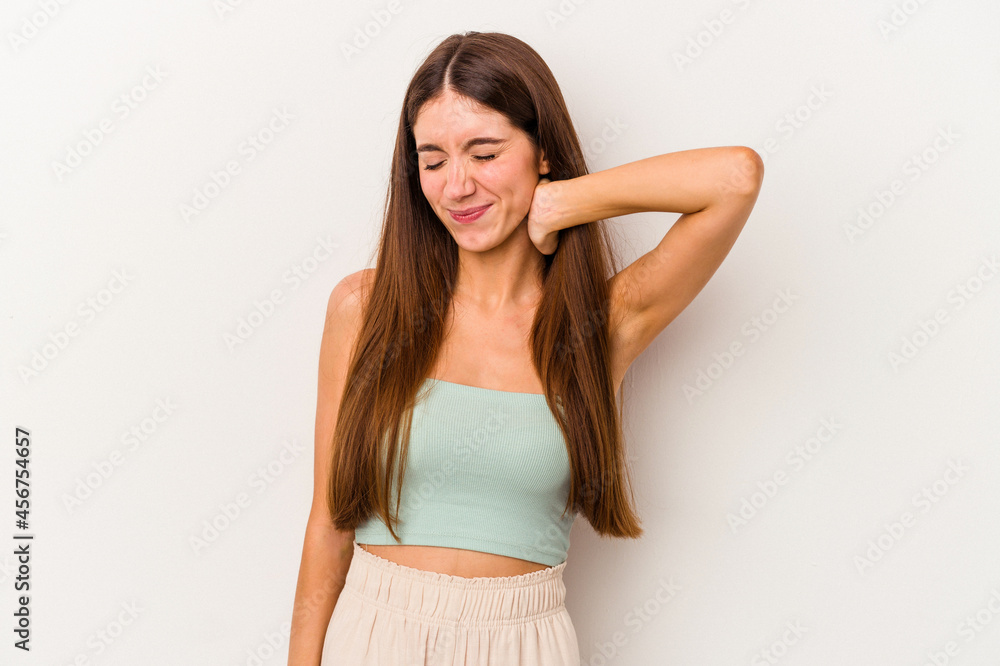 Young caucasian woman isolated on white background suffering neck pain due to sedentary lifestyle. Young caucasian woman isolated on white background suffering neck pain due to sedentary lifestyle.