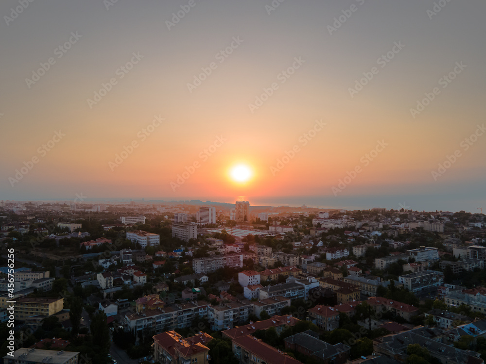 panorama of a seaside town at sunset from the air. Black Sea.