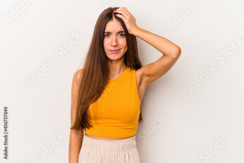 Young caucasian woman isolated on white background tired and very sleepy keeping hand on head.