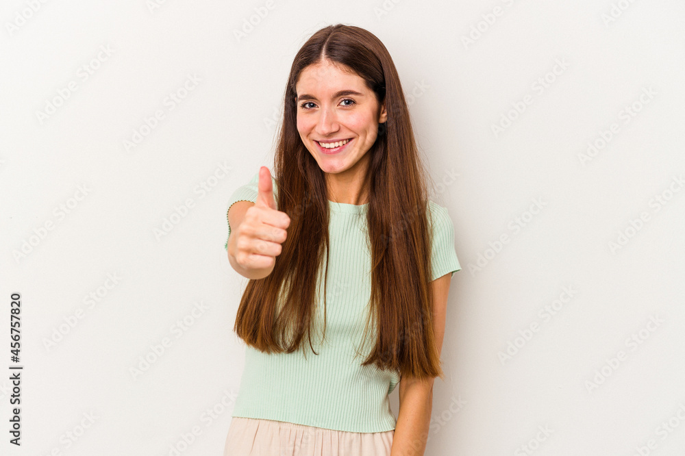 Young caucasian woman isolated on white background smiling and raising thumb up Young caucasian woman isolated on white background smiling and raising thumb up