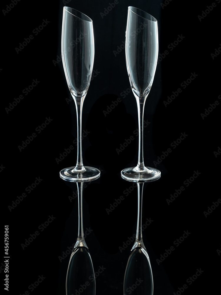 wine glasses with beveled edges on black background