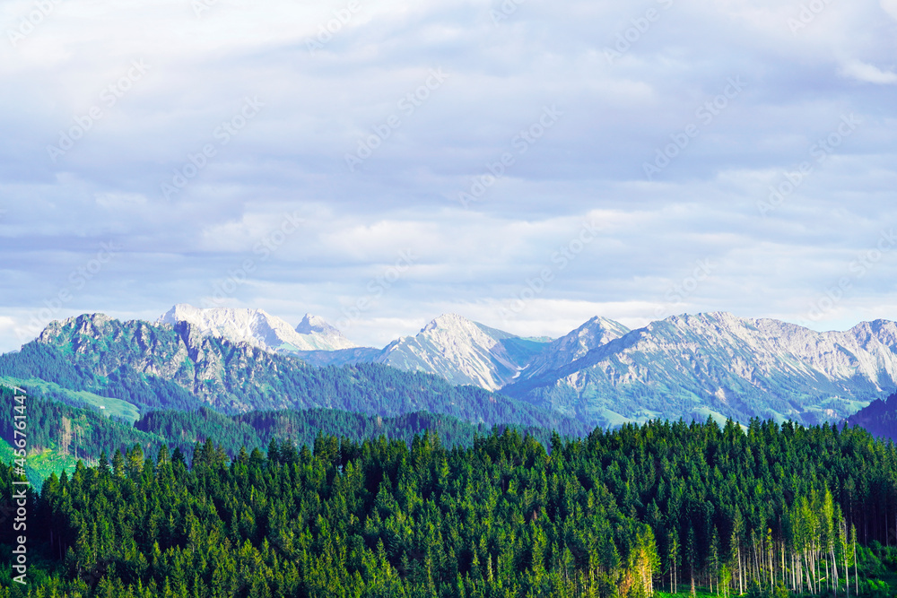 Obraz premium Panorama landscape in the Allgäu in Bavaria. Nature with mountains, meadows and forests.