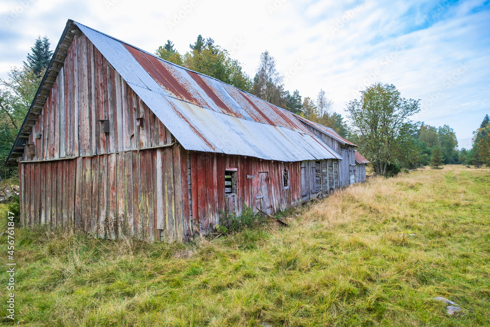 Old abandoned barn on a meadow Old abandoned barn on a meadow