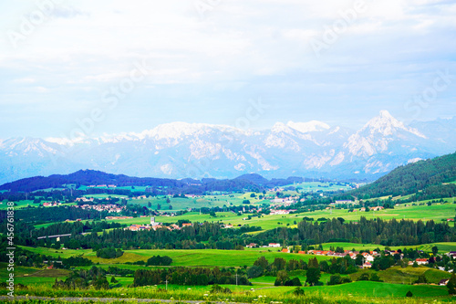 Panorama landscape in the Allgäu in Bavaria. Nature with mountains, meadows and forests.