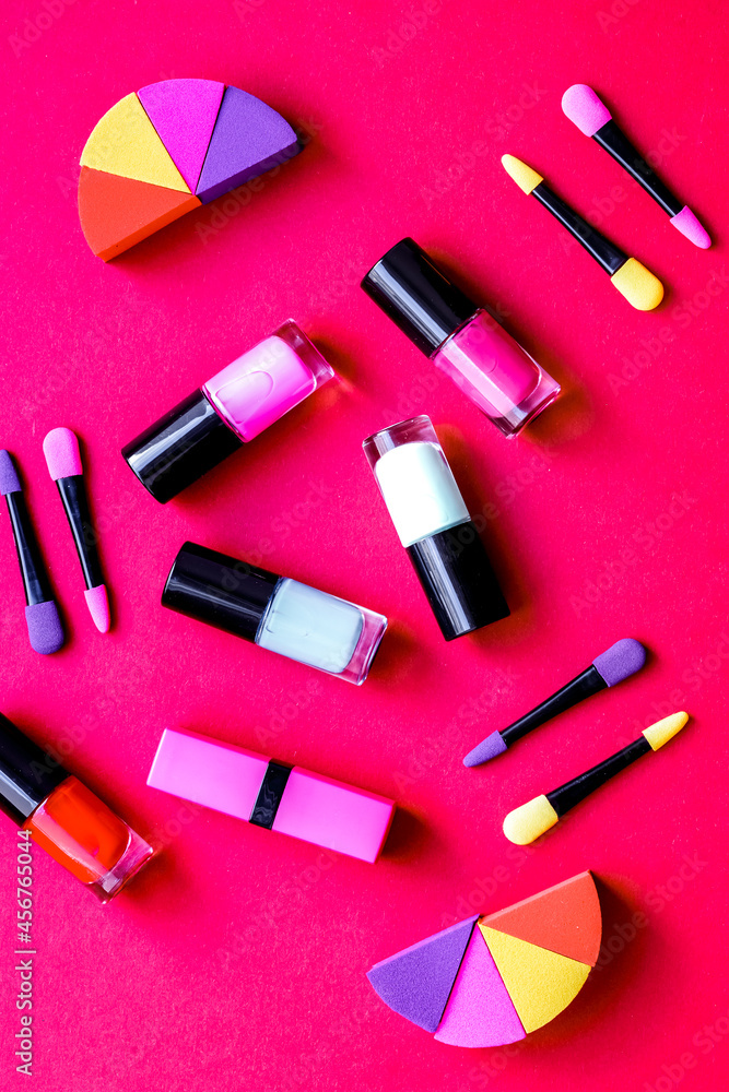 Obraz premium make up set on red background top view