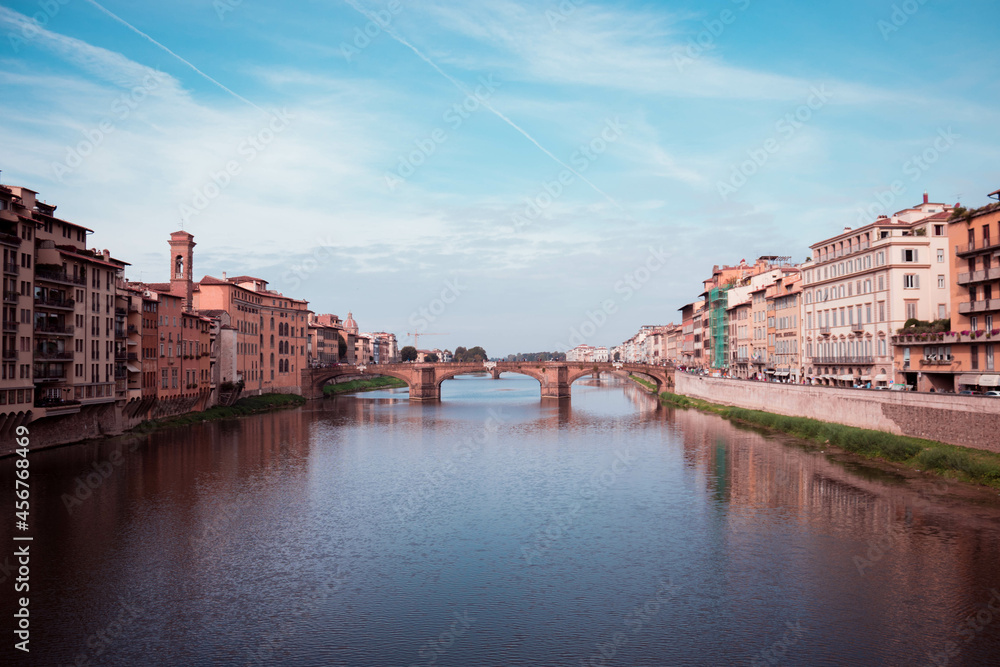 Landscape shot of Florence river with a bridge and buildings around