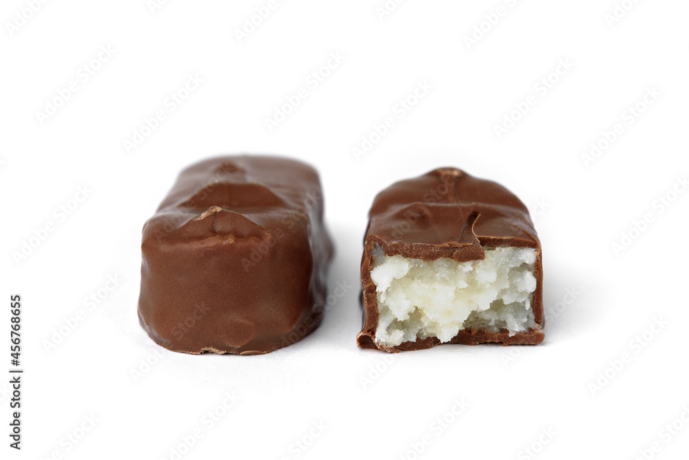 Chocolate bar with coconut filling isolated on white background. Chocolate bar with coconut filling isolated on white background.