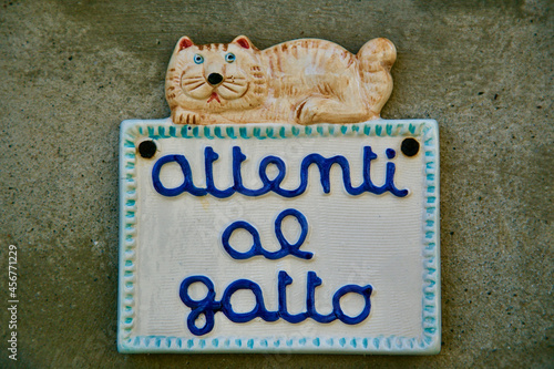 porcelain painting of a kitten on the wall