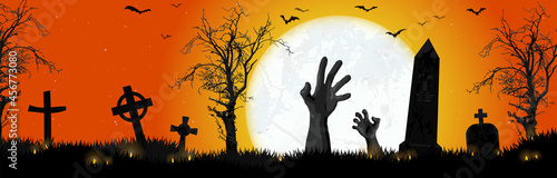 Halloween zombie hands in front of full moon