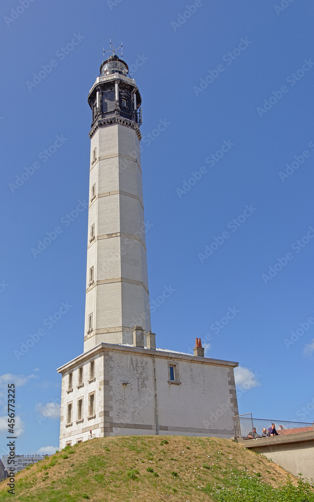 Calais lighthouse or Phare de Calais, France on a sunny day with clear blue sky
