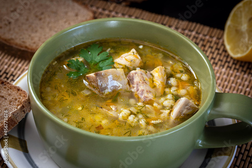 Mackerel fish soup with lemon and country bread.