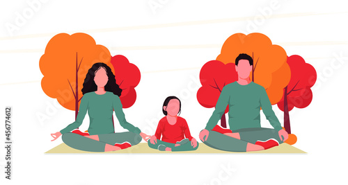 Family practicing yoga in the autumn park. People sitting in lotus pose on the bench isolated on the white background