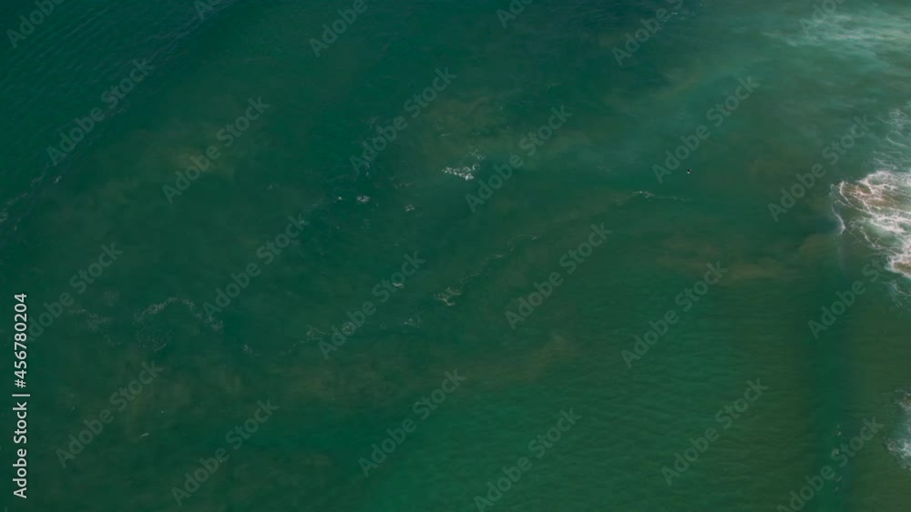 Aerial top down view of the ocean on a beautiful calm day at the popular seaway lookout The Spit Gold Coast QLD Australia