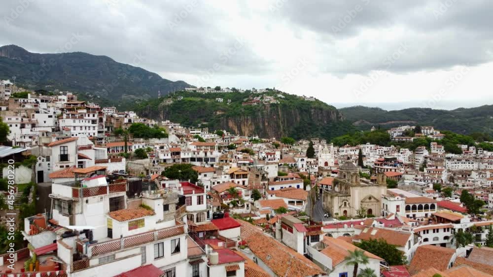 The terraced hillside homes in the Spanish Colonial style of the town of Taxco Mexcio. The terraced hillside homes in the Spanish Colonial style of the town of Taxco Mexcio.
