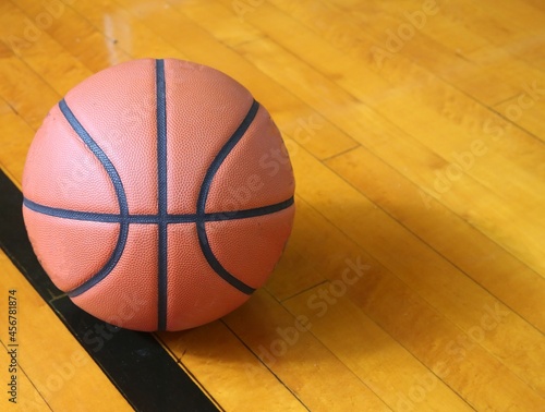 basketball on wooden gym floor