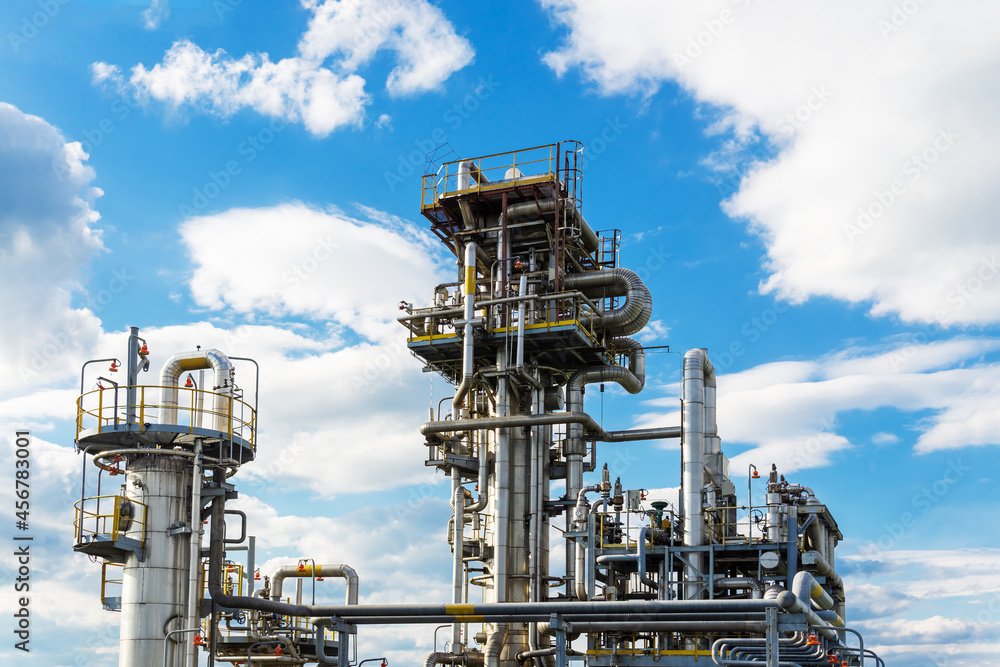 View of the absorption distillation column of gas liquefaction in summer. View of the absorption distillation column of gas liquefaction in summer.