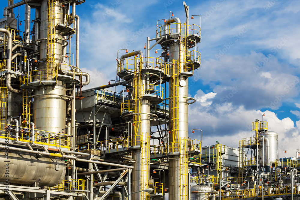 View of the absorption distillation column of gas liquefaction in summer. View of the absorption distillation column of gas liquefaction in summer.