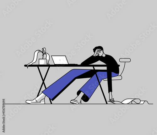 Tired office worker sits by desk with laptop and long list of work tasks