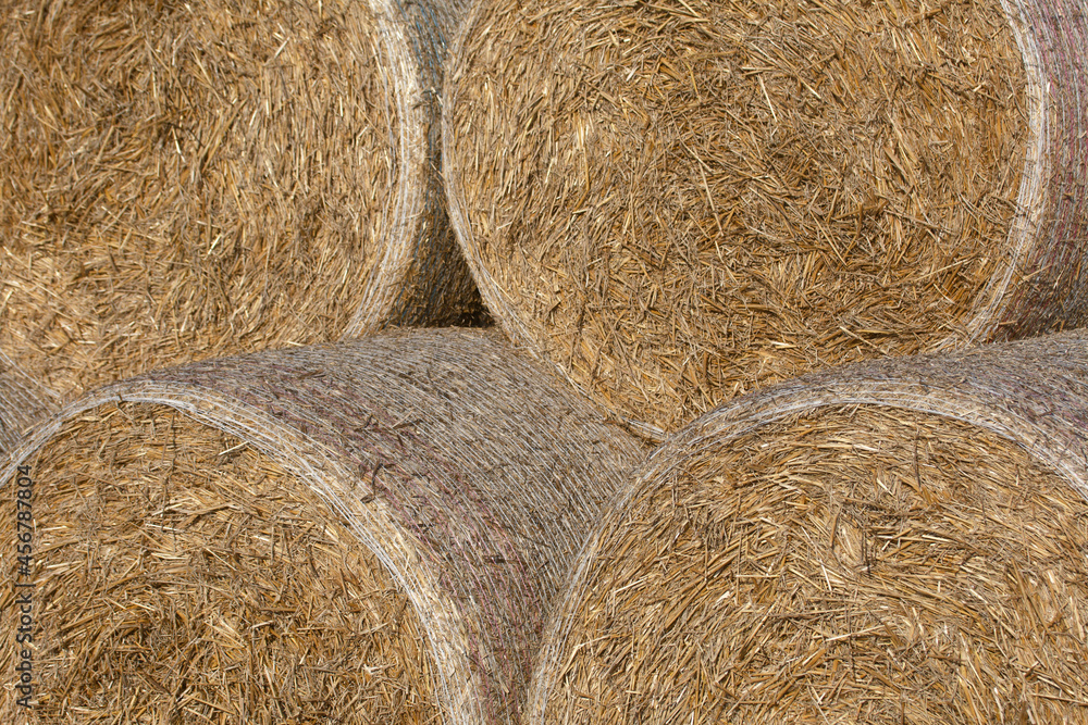 Straw rolls, stacked in a pyramid. Close-up shot. Straw rolls, stacked in a pyramid. Close-up shot.