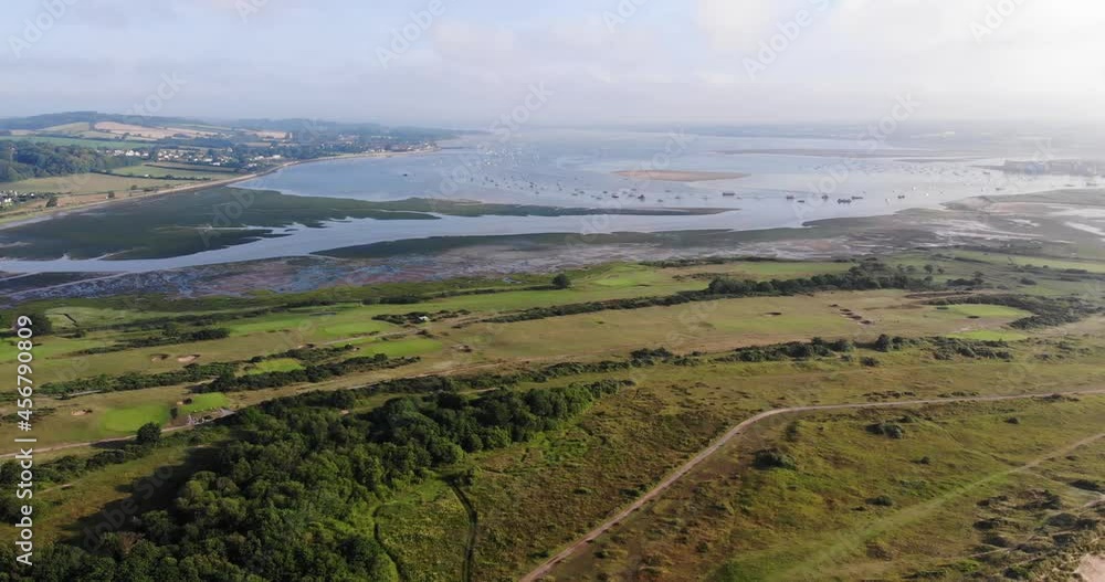 Aerial Pan Right View Of Dawlish Golf Course And Mouth Of River Exe Aerial Pan Right View Of Dawlish Golf Course And Mouth Of River Exe