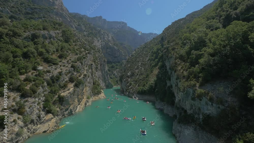 Verdon River Canyon with many boats on turquoise waters. Verdon Gorge National Park, France