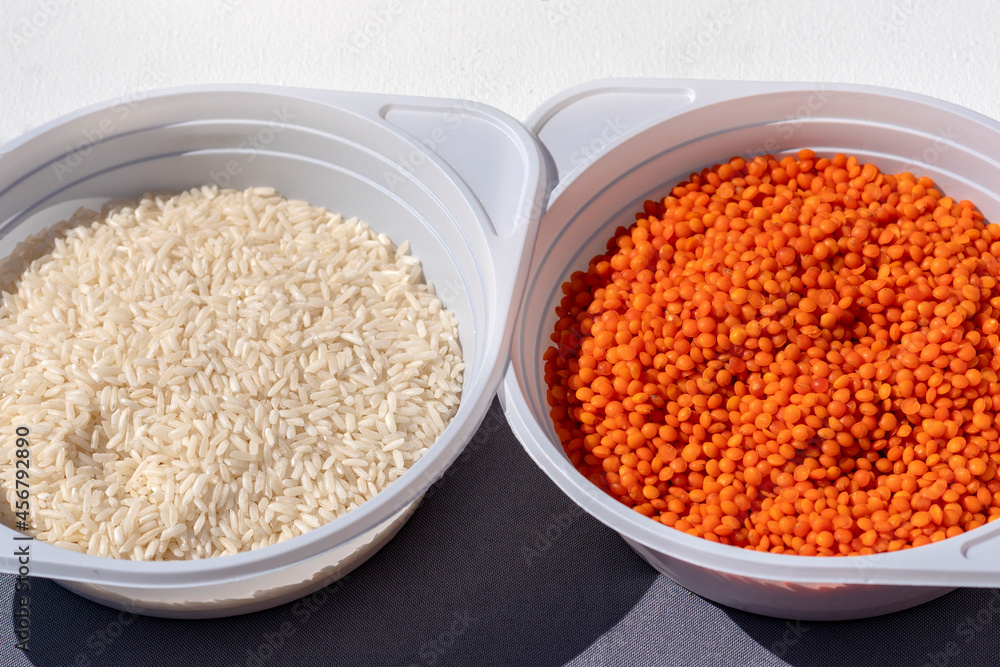 Millet groats. plastic plate with cereal. Vegetarian food . close-up Millet groats. plastic plate with cereal. Vegetarian food . close-up