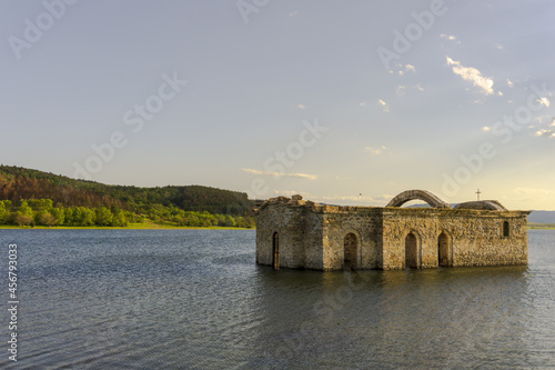 The submerged church of St. Ivan Rilski on the dam Zhrebchevo Bulgaria photo