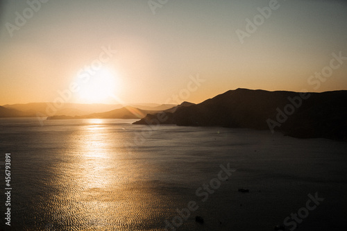 Seascape. Sunset on the coast. Evening sea. The sun is below the horizon. Rocks. Beautiful nature