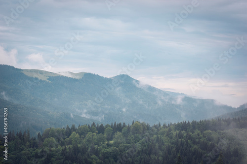 Mountains after the rain. Water evaporates from the forest