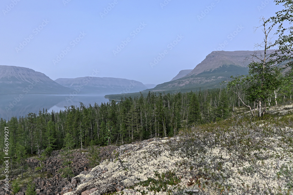 Putorana Plateau, a misty haze over the lake. Putorana Plateau, a misty haze over the lake.