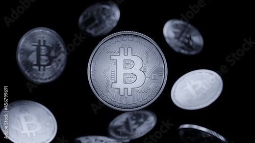 Bitcoins silver coins. Close-up photos of the main cryptocurrency. 3D model render