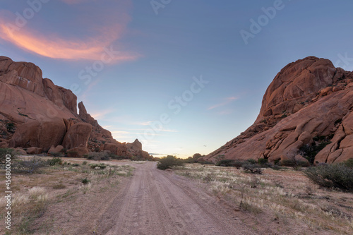 Pink cloud and blue sky before sunrise at Spitzkoppe