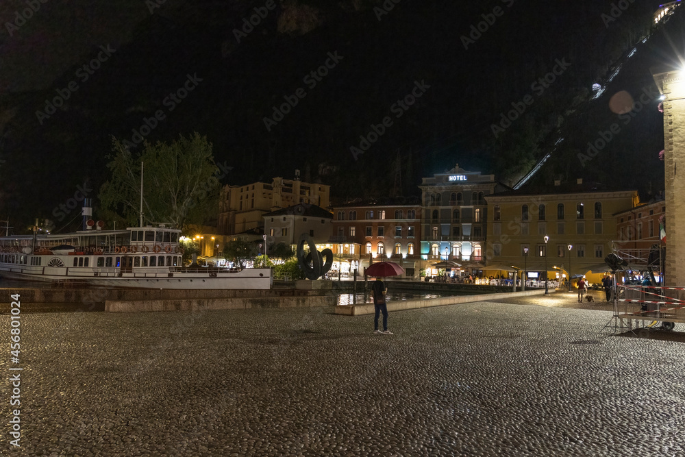 Night Harbour scene in Riva del Garda after thundershower Night Harbour scene in Riva del Garda after thundershower