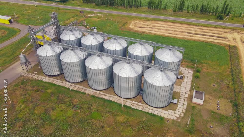 Grain elevator in agricultural zone. Aerial view of Grain storage warehouse Grain elevator in agricultural zone. Aerial view of Grain storage warehouse