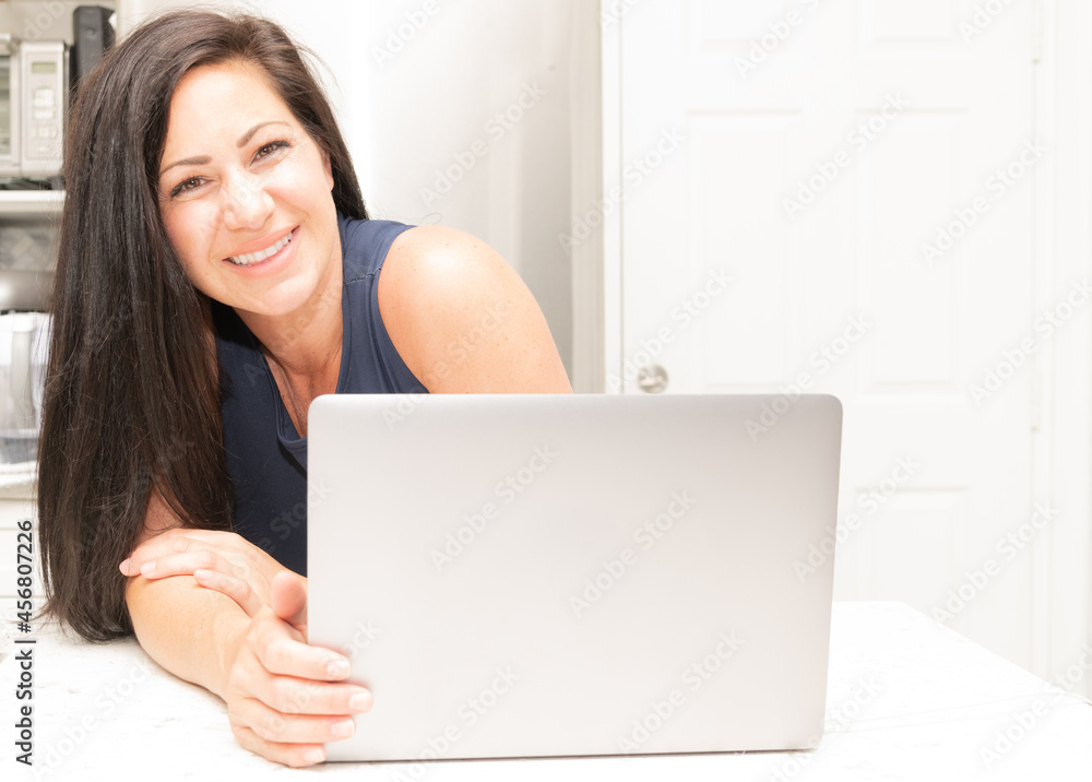 Working from home in a bright modern setting Working from home in a bright modern setting