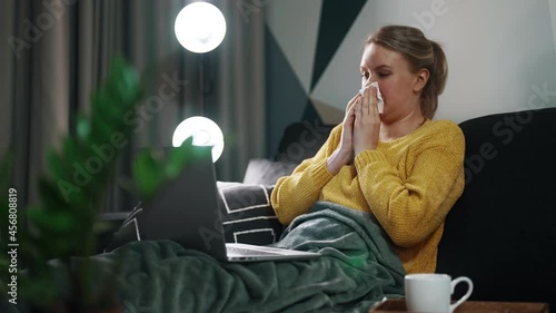 Sick woman is working from home.