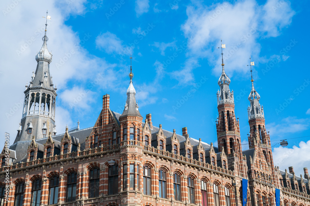 Ornate architecture of Amsterdam old Post Office, now upmarket shopping mall and famous landmark Ornate architecture of Amsterdam old Post Office, now upmarket shopping mall and famous landmark
