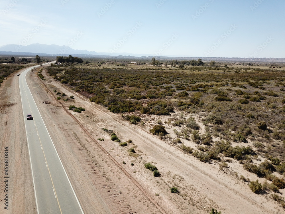 Desert road on desert landscape